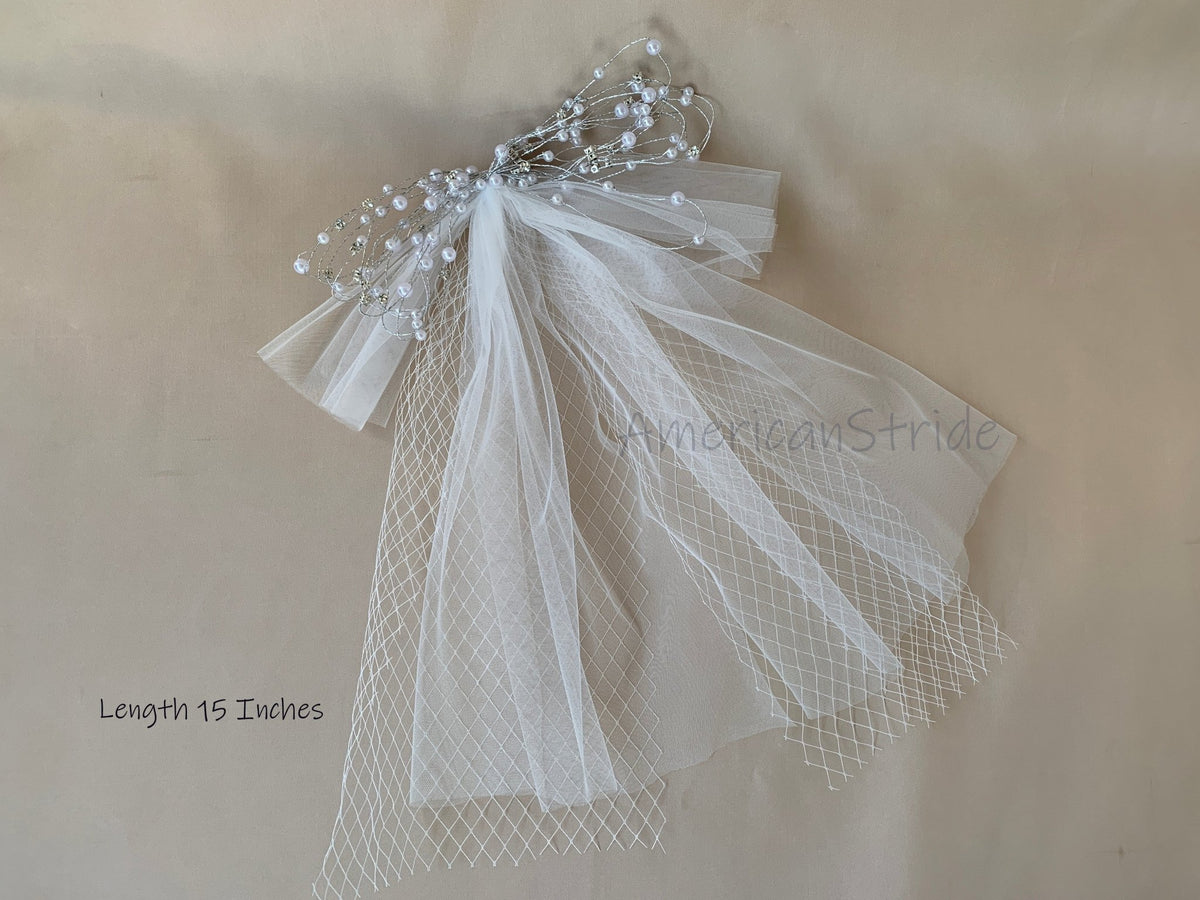 White pearl rhinestone flower girl veil.