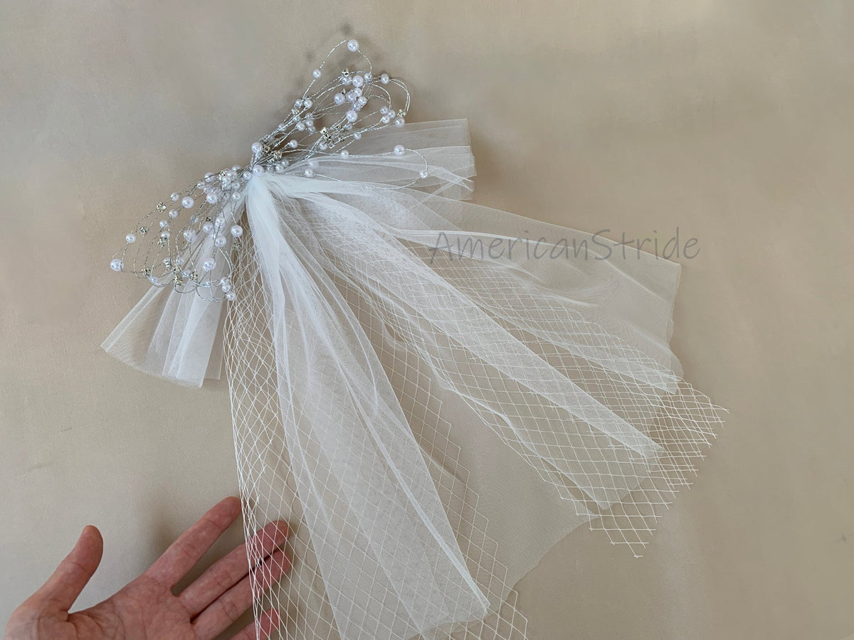 White pearl rhinestone flower girl veil.