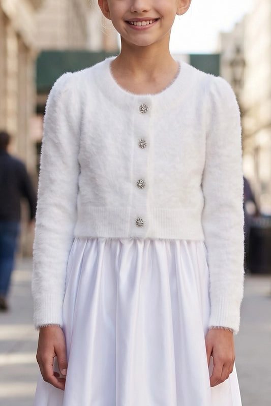 Featuring cropped silhouette and jewel buttons, this Ivory fuzzy flower girl bolero cardigan with jewel buttons adds a layer over dresses.
