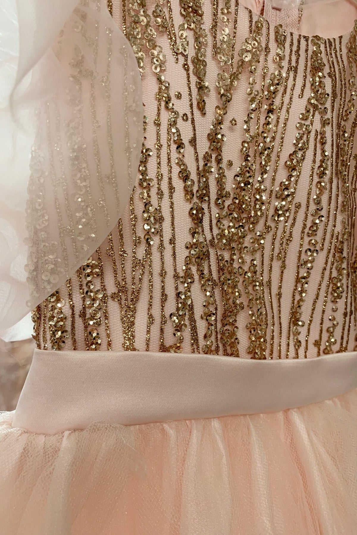 Blush USA Made | Glittering Sequin bodice Luxurious Tulle with Organza Bubble Sleeve Tea-length flower girl dress - zoomed in view of dress featuring pattern and exquisite details.