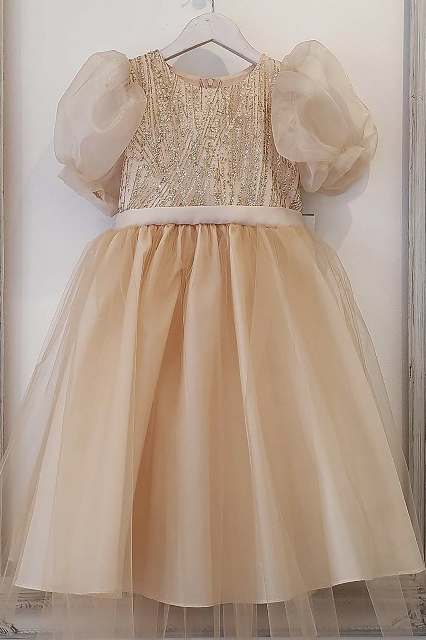 Puff sleeve champagne glittering sequin flower girl dress.