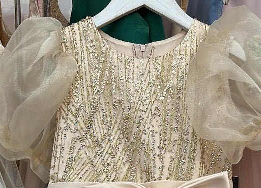 Champagne USA Made | Glittering Sequin bodice Luxurious Tulle with Organza Bubble Sleeve Tea-length flower girl dress - zoomed in view of front of dress.