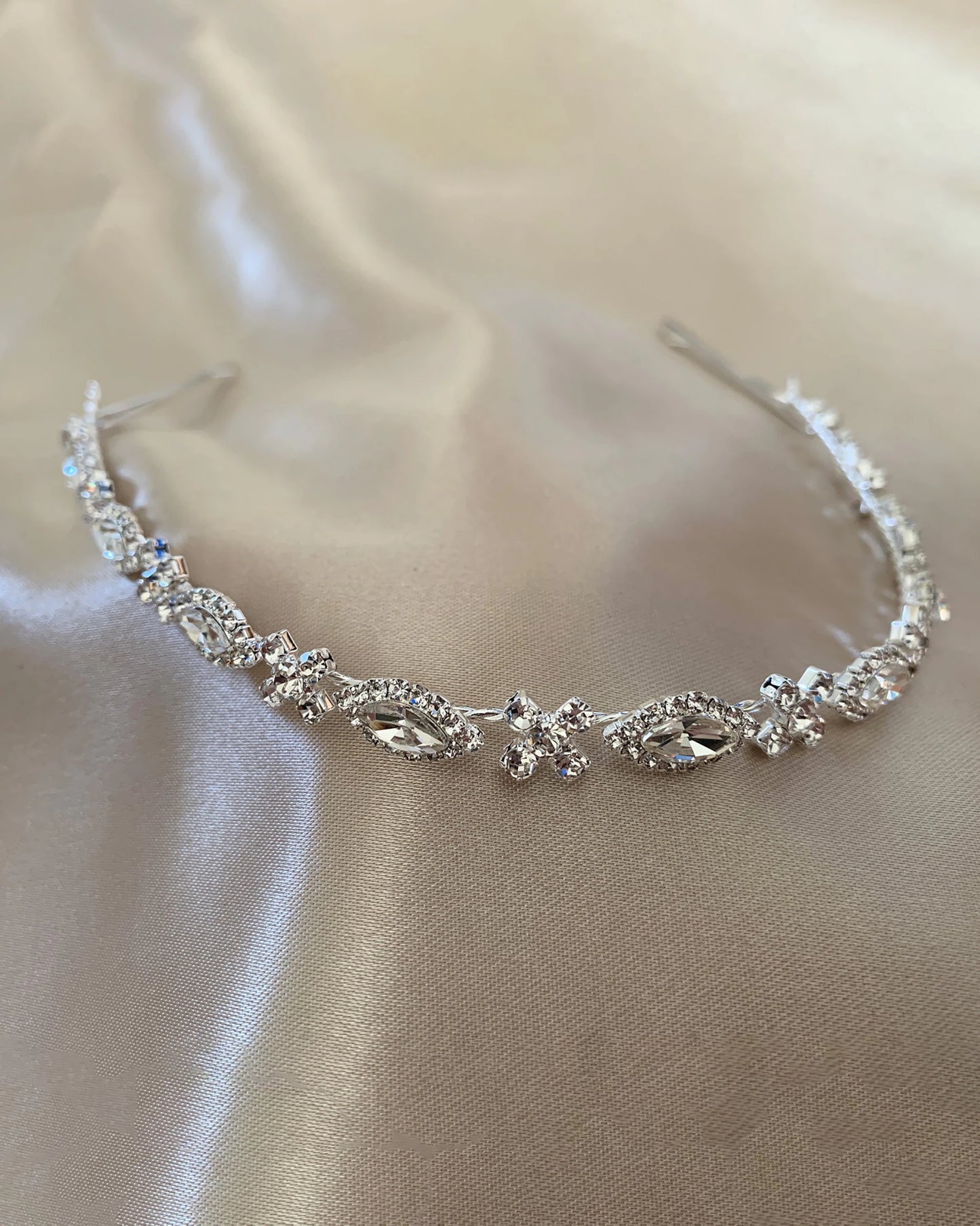 Silver rhinestone bridal headpiece or sash belt.