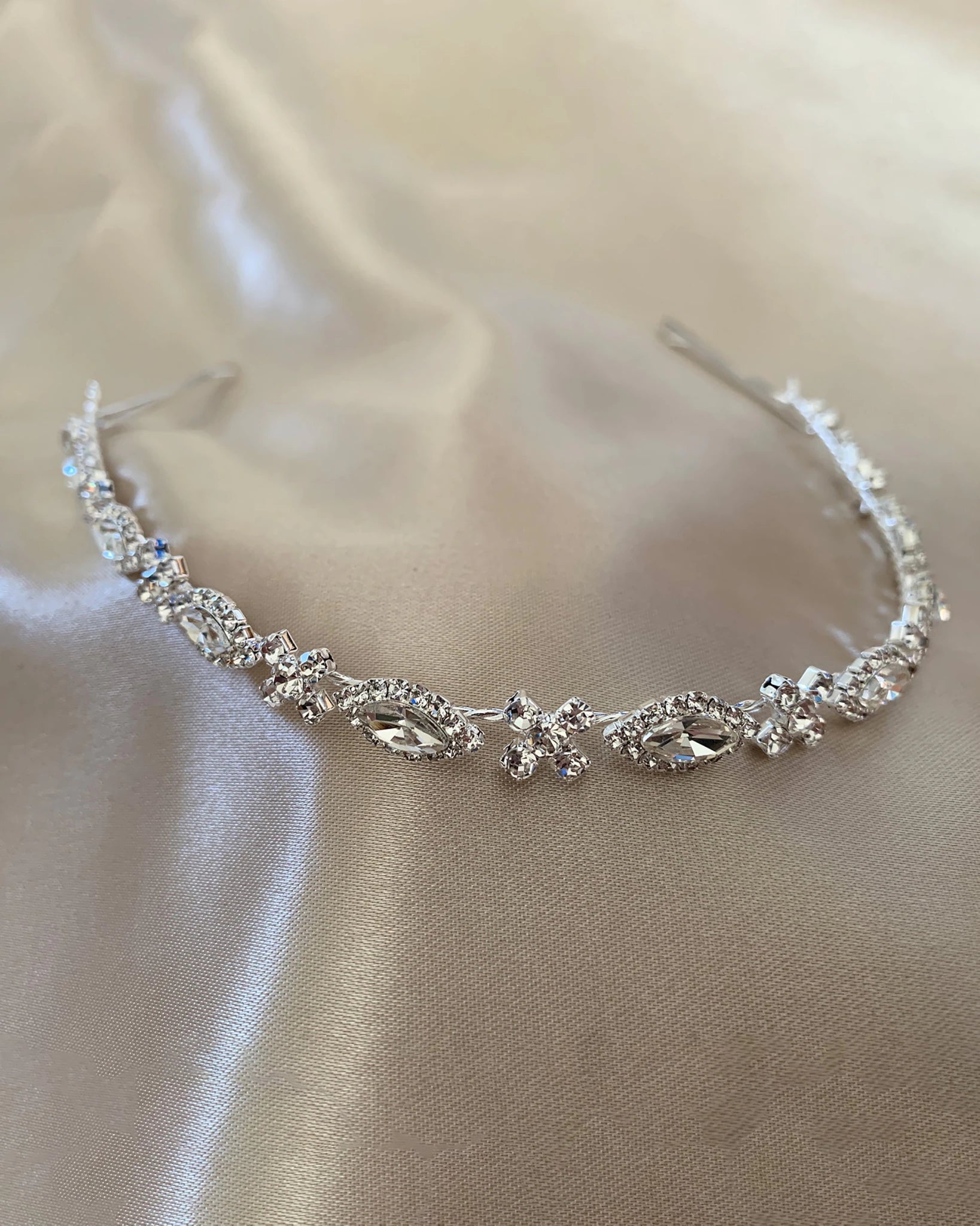 Silver rhinestone bridal headpiece or sash belt.