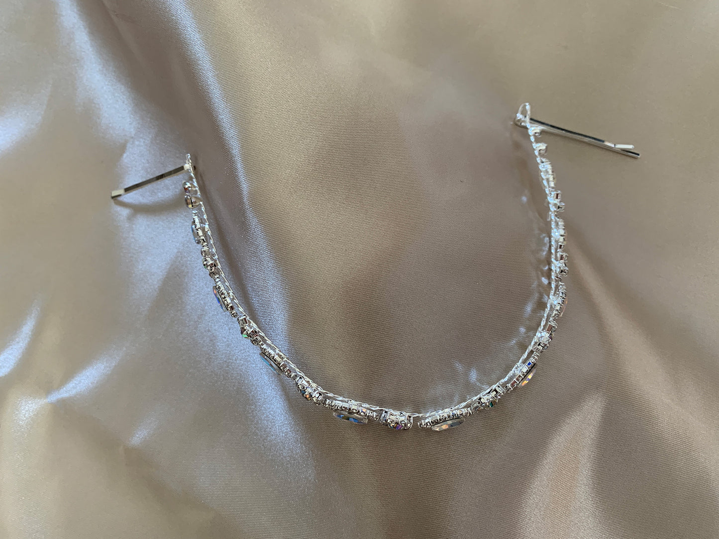 Silver pearl rhinestone bridal headpiece or sash belt, top view.