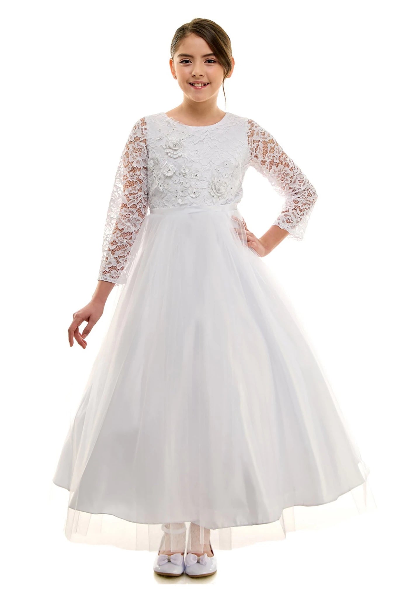 White communion dress with lace sleeves.