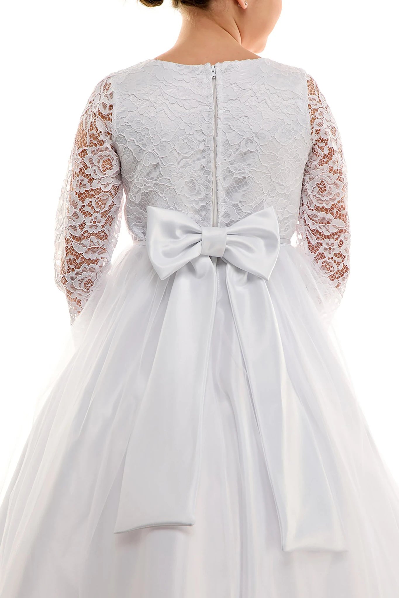 White lace communion dress with a large bow on the back.