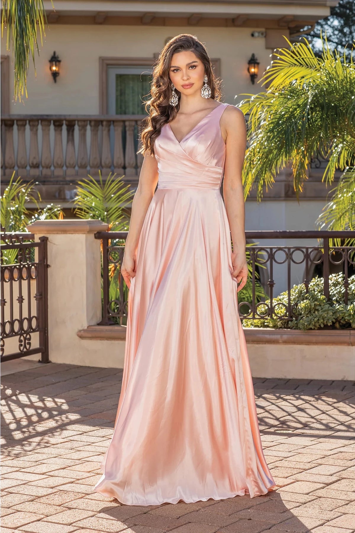 Featuring a floor-length skirt, this Blush prom dress is shown in full view.
