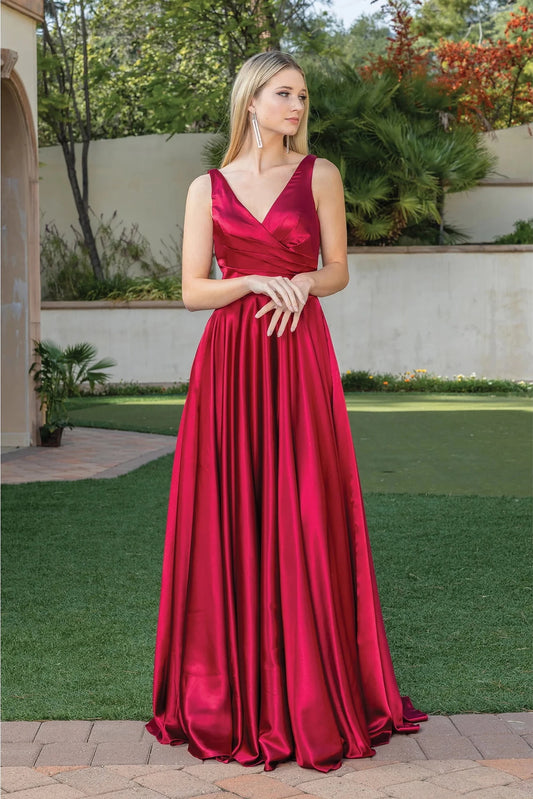 Featuring a floor-length skirt, this Burgundy prom dress is shown in full view.