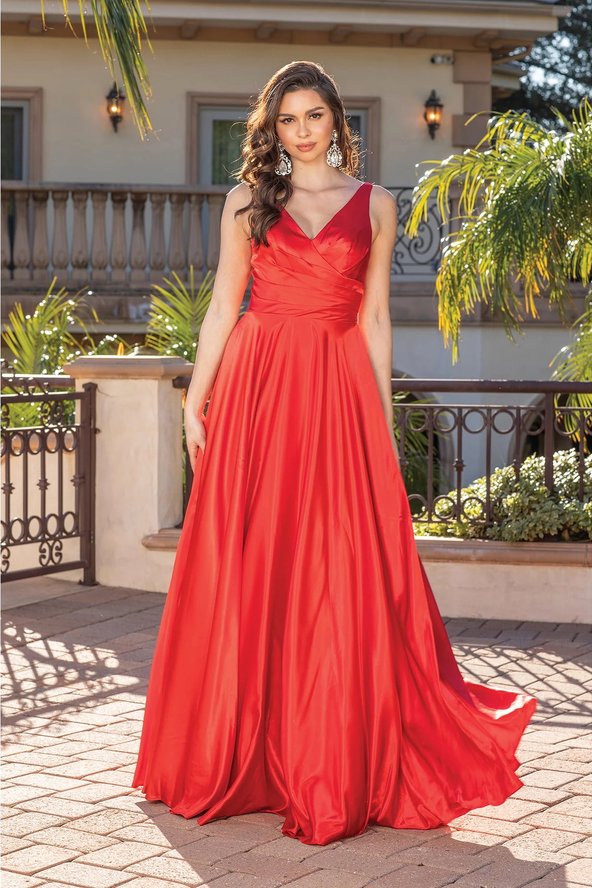 Featuring a floor-length skirt, this Red prom dress is shown in full view.