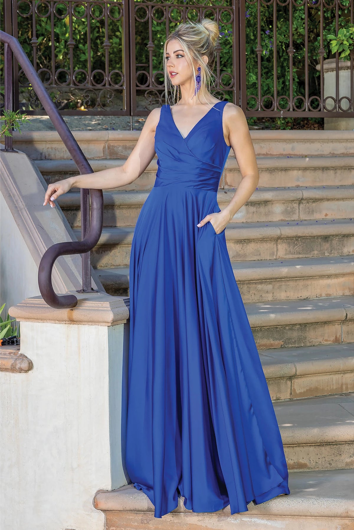 Featuring a floor-length skirt, this Royal Blue prom dress is shown in full view.