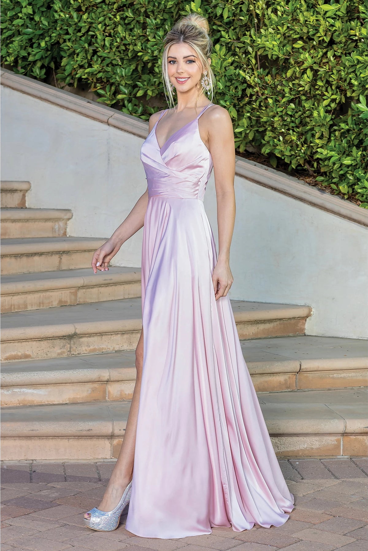 Featuring a floor-length skirt, this Blush prom dress is shown in full view.