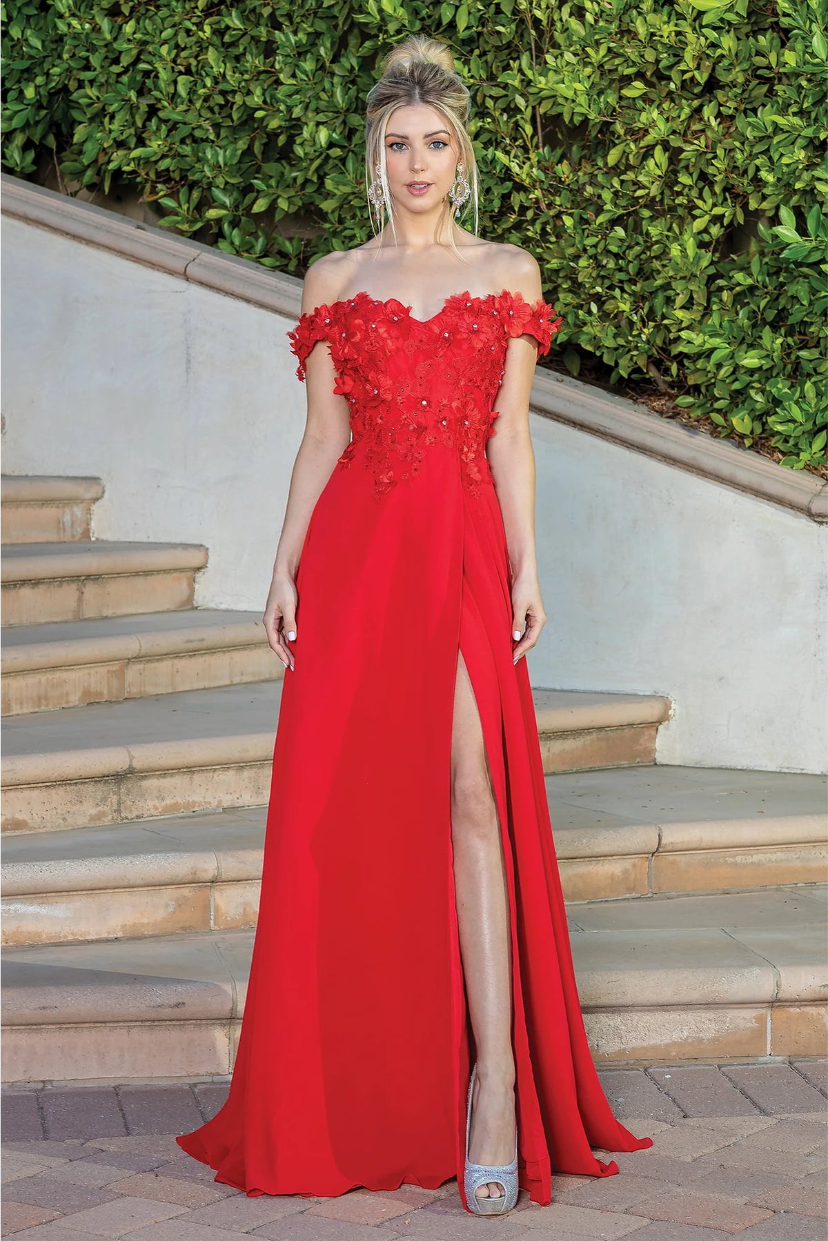 Featuring a floor-length skirt, this Red prom dress is shown in full view.