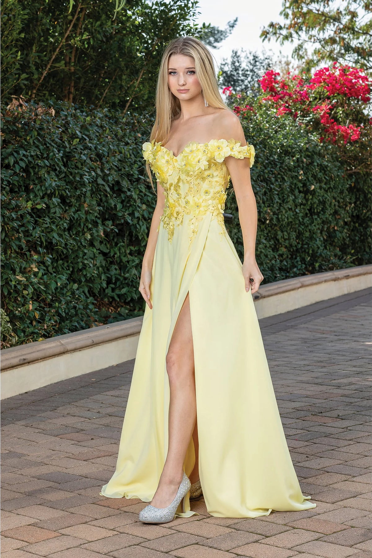 From the front, the Yellow prom dress reveals its floor-length skirt.