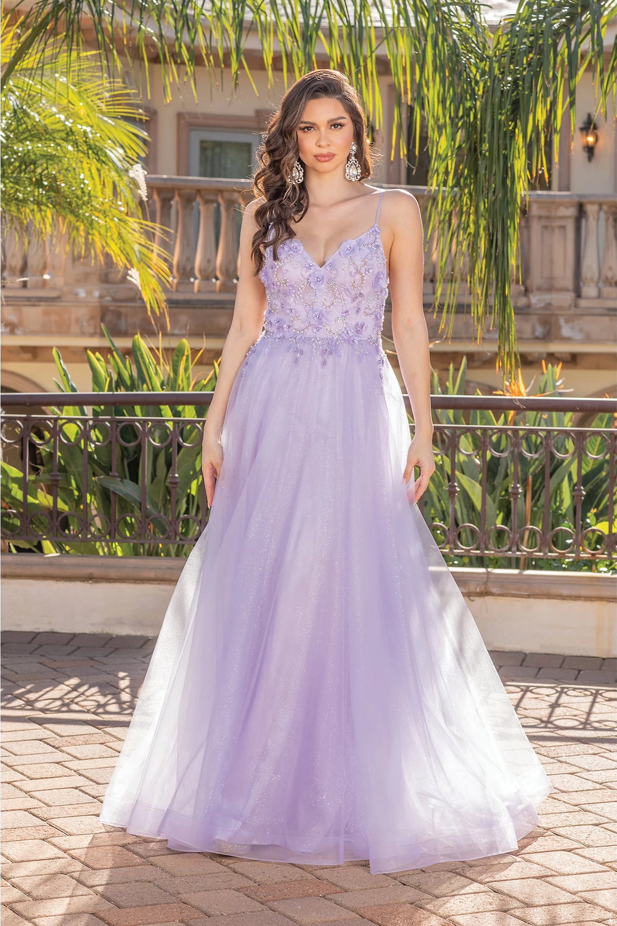 Featuring a floor-length skirt, this Lilac prom dress is shown in full view.