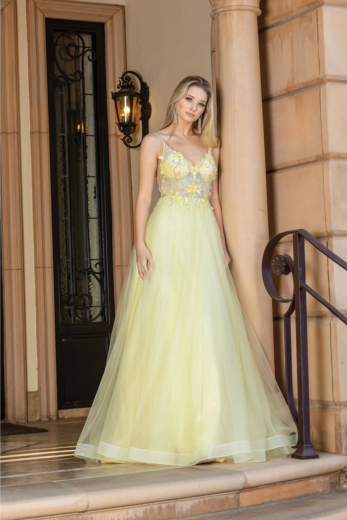 From the front, the Yellow prom dress reveals its floor-length skirt.