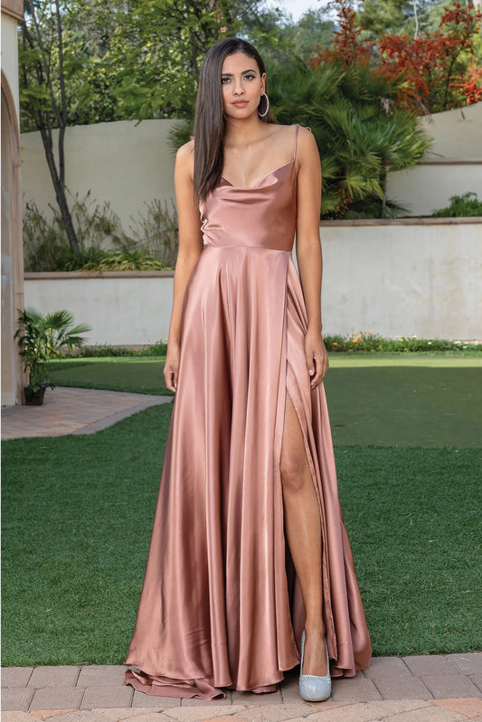 Featuring a floor-length skirt, this Copper prom dress is shown in full view.