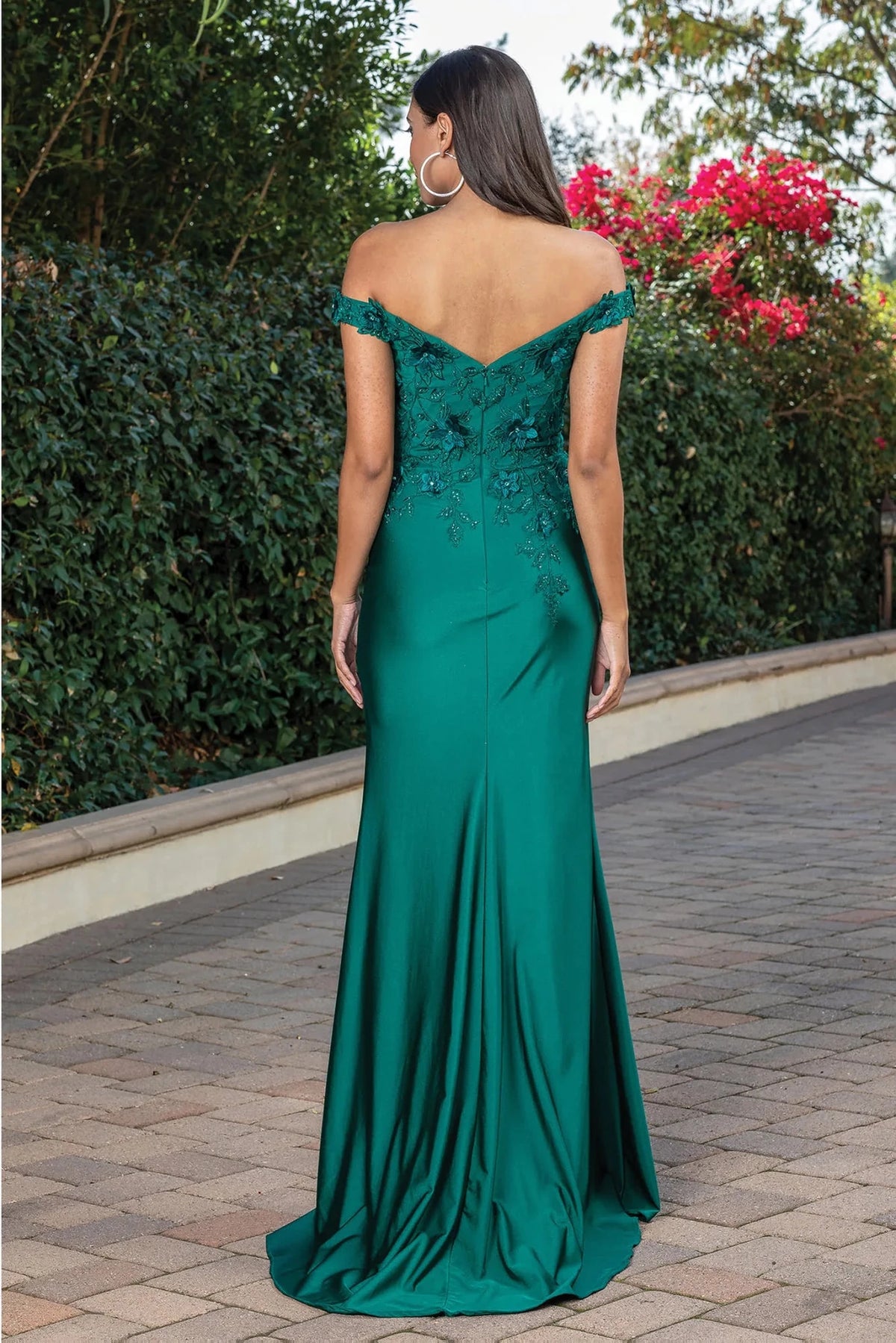 Featuring a floor-length skirt, this Hunter Green prom dress is shown in full view.