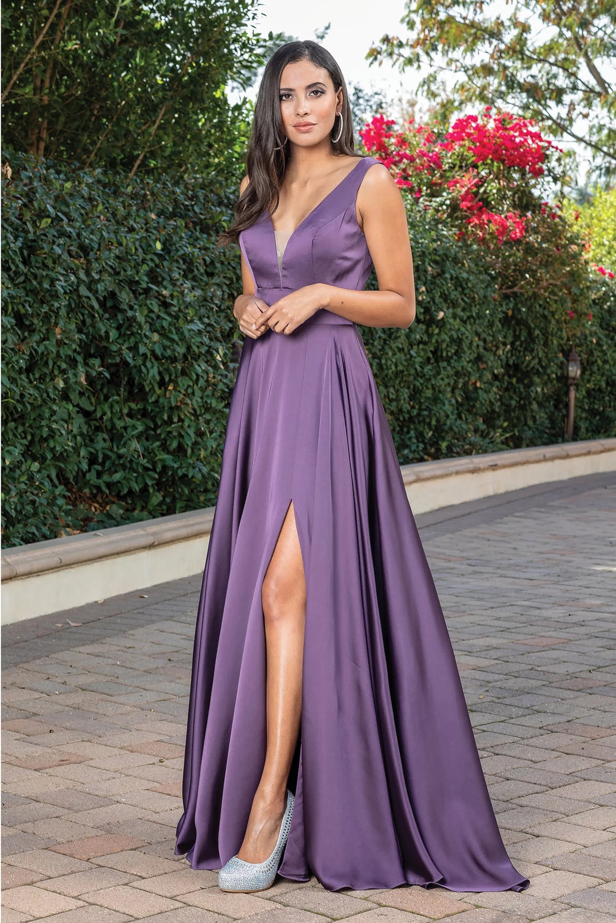 Featuring a floor-length skirt, this Eggplant prom dress is shown in full view.