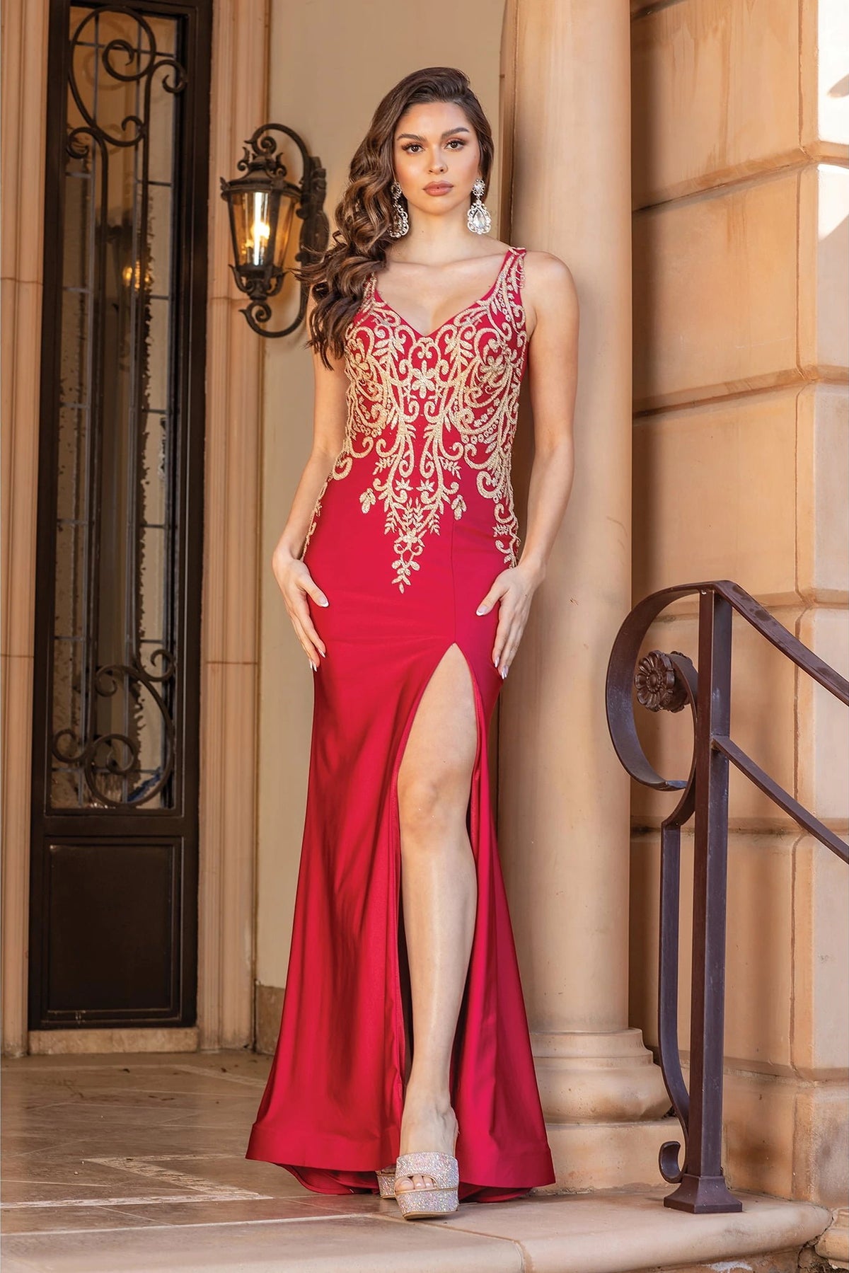 Featuring a floor-length skirt, this Burgundy prom dress is shown in full view.