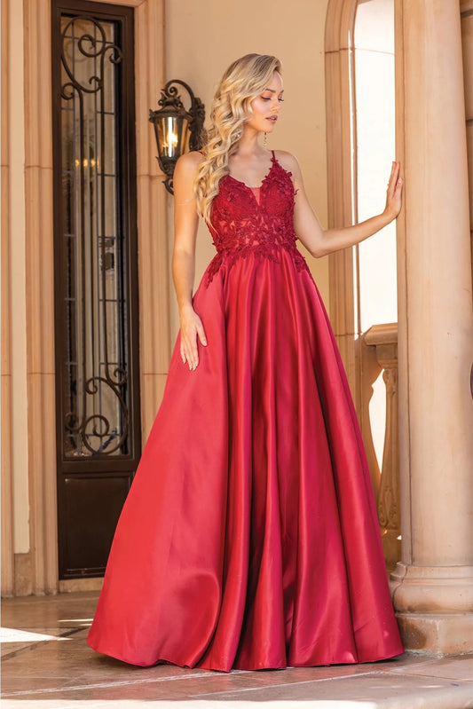 Featuring a floor-length skirt, this Burgundy prom dress is shown in full view.
