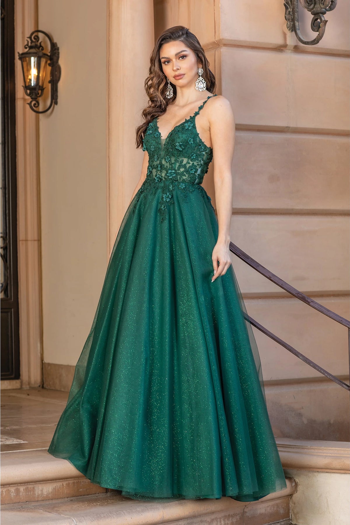 Featuring a floor-length skirt, this Hunter Green prom dress is shown in full view.