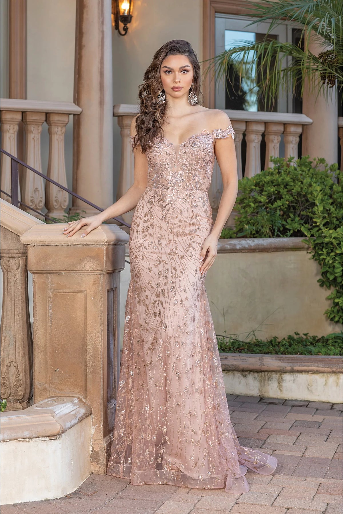 Featuring a floor-length skirt, this Rose Gold prom dress is shown in full view.