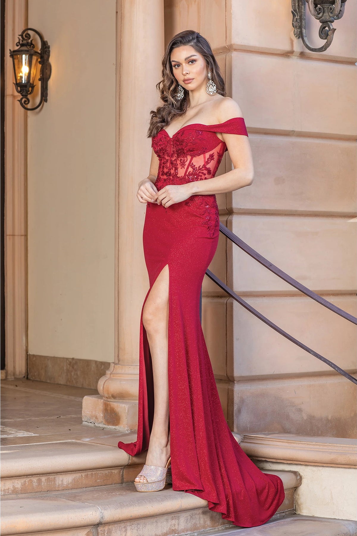 Featuring a floor-length skirt, this Burgundy prom dress is shown in full view.