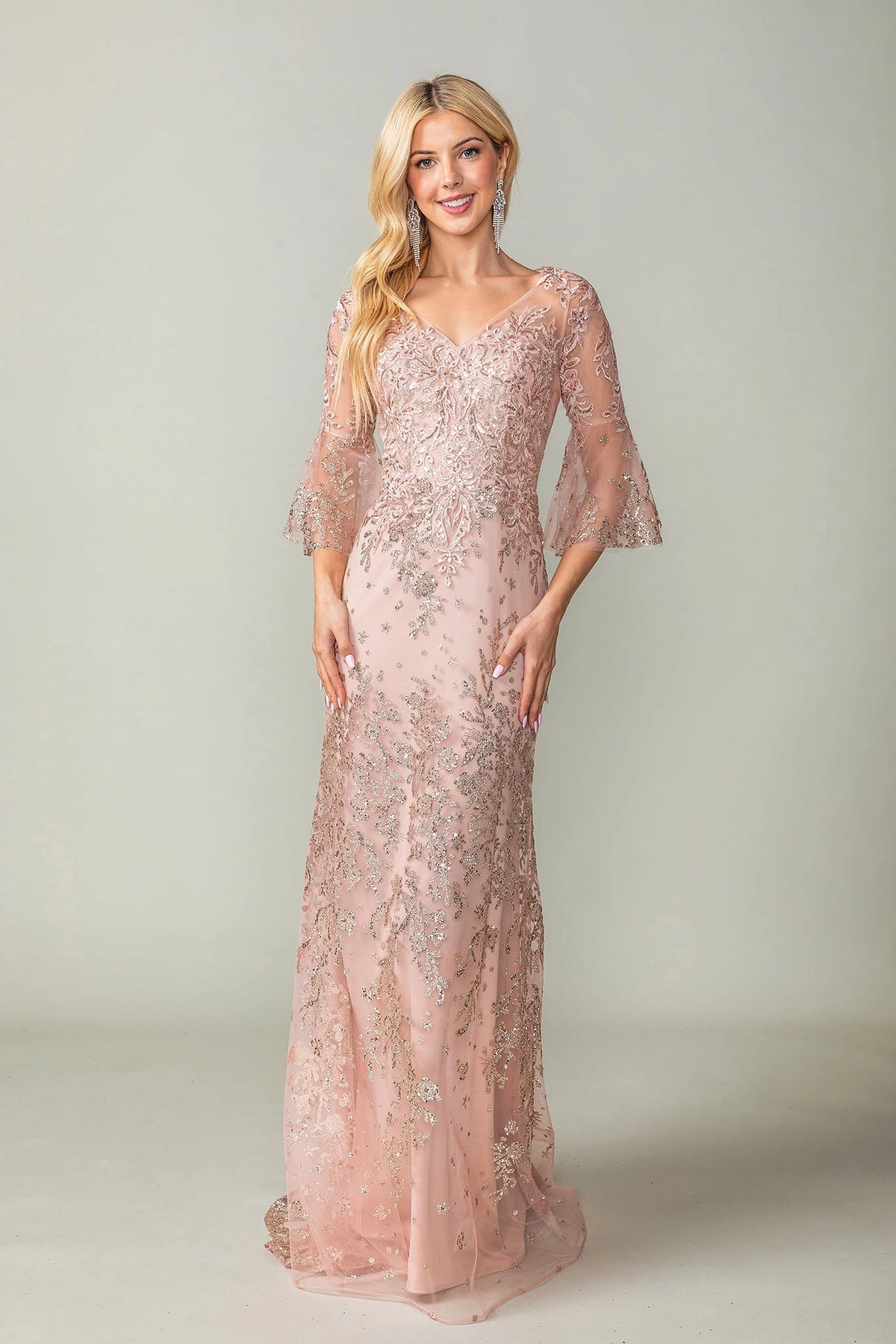 Featuring a floor-length skirt, this Rose Gold prom dress is shown in full view.
