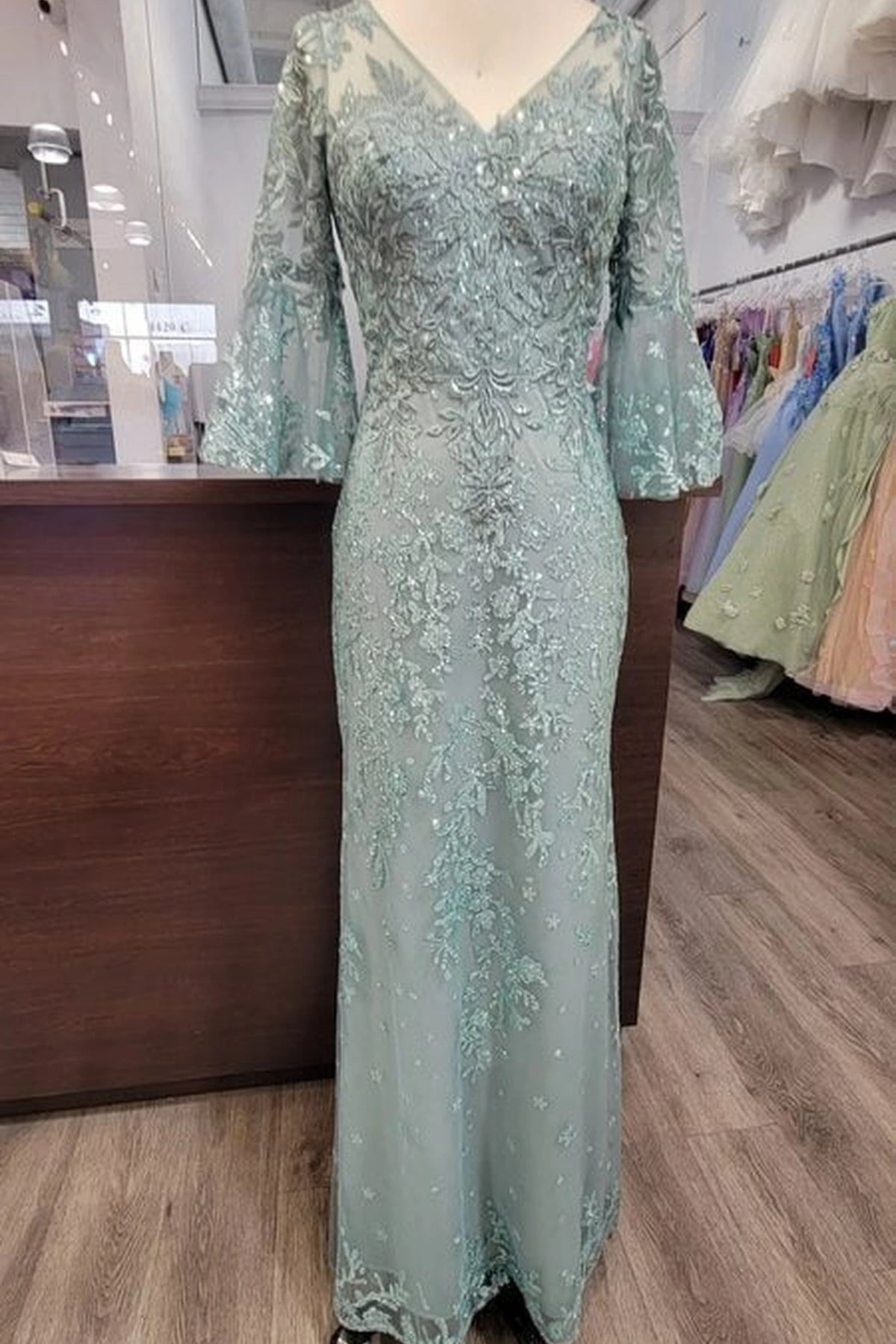 From the front, the Sage prom dress reveals its floor-length skirt.