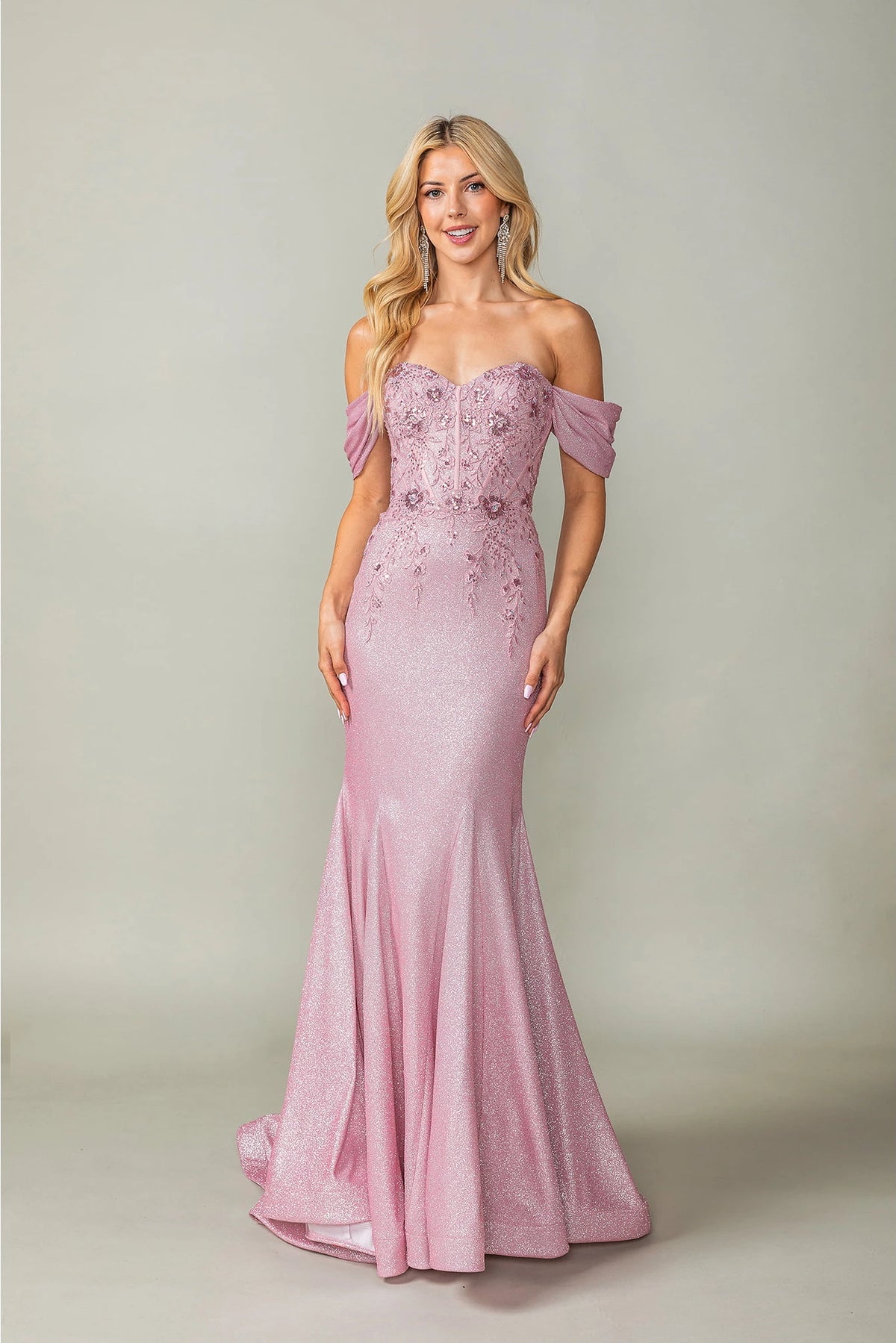 Featuring a floor-length skirt, this Dusty Rose prom dress is shown in full view.