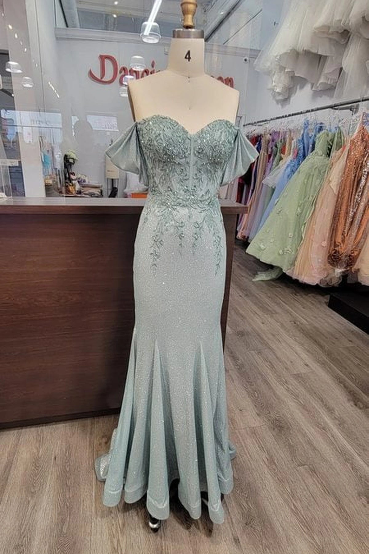 From the front, the Sage prom dress reveals its floor-length skirt.