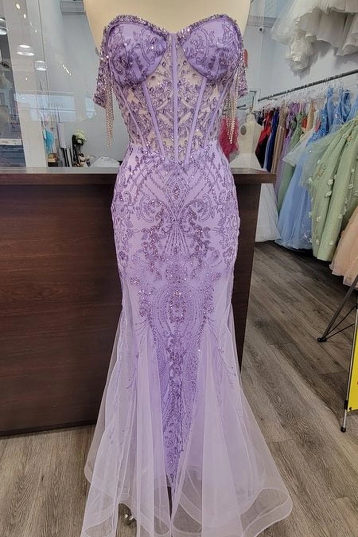 From the front, the Lilac prom dress reveals its floor-length skirt.