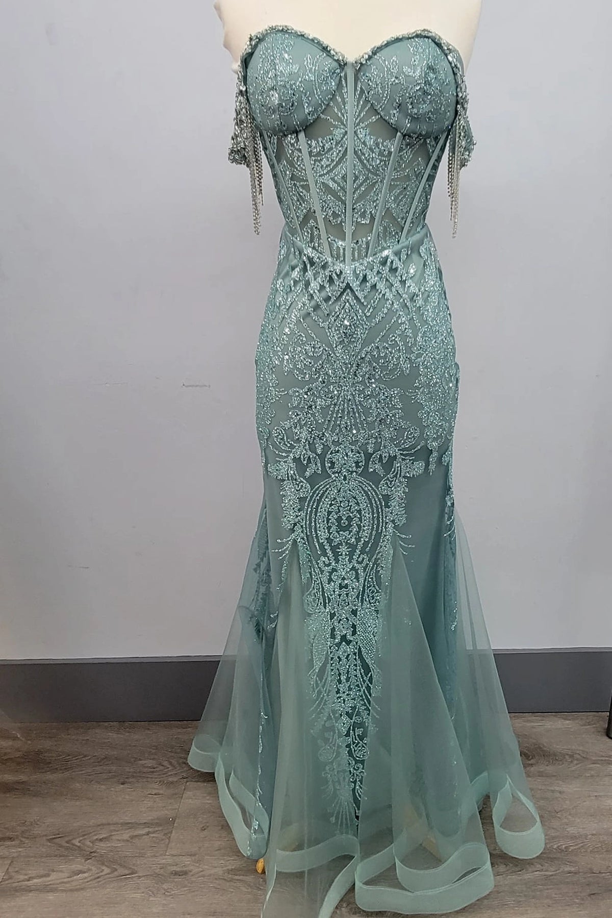 From the front, the Sage prom dress reveals its floor-length skirt.