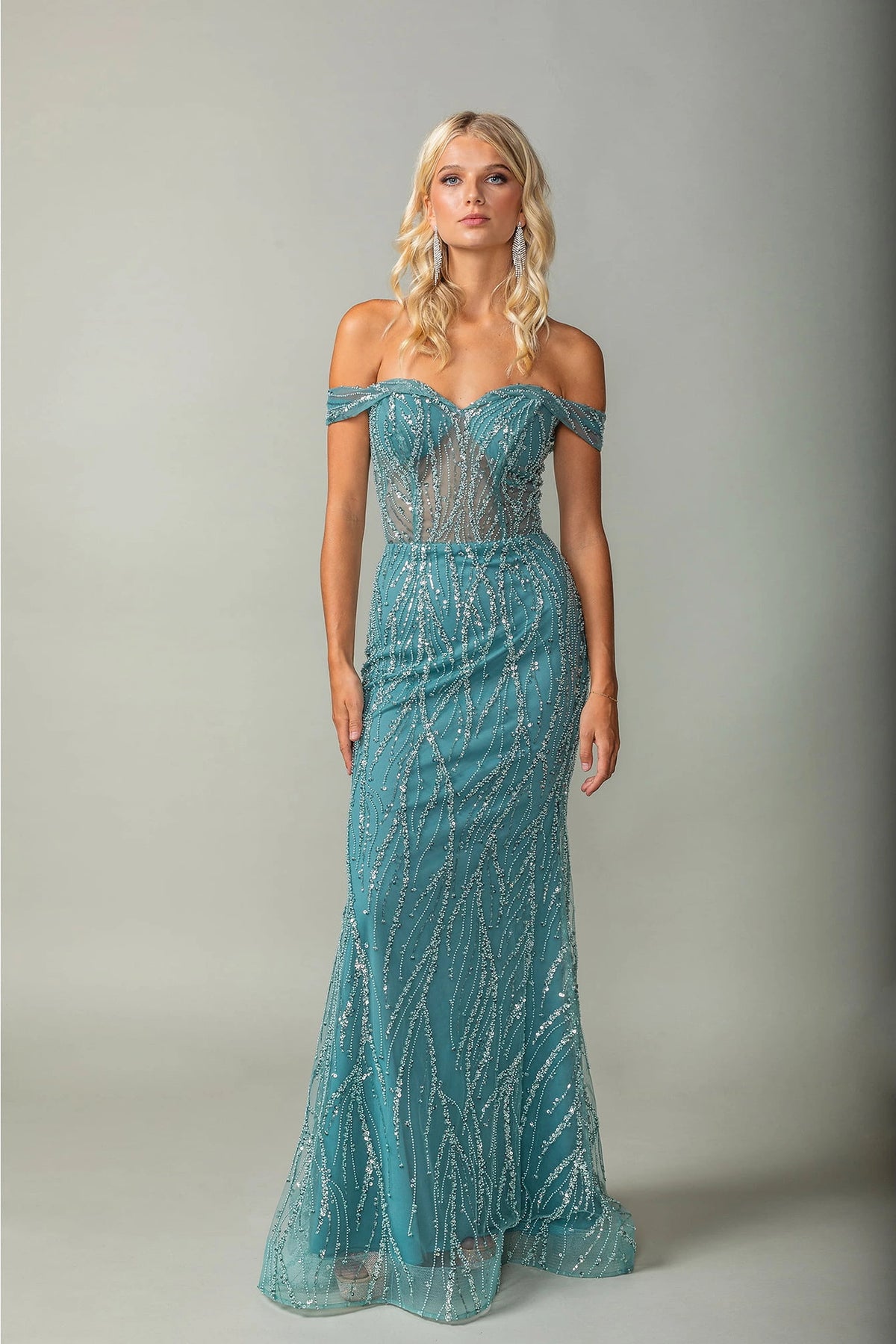 Featuring a floor-length skirt, this Sage prom dress is shown in full view.