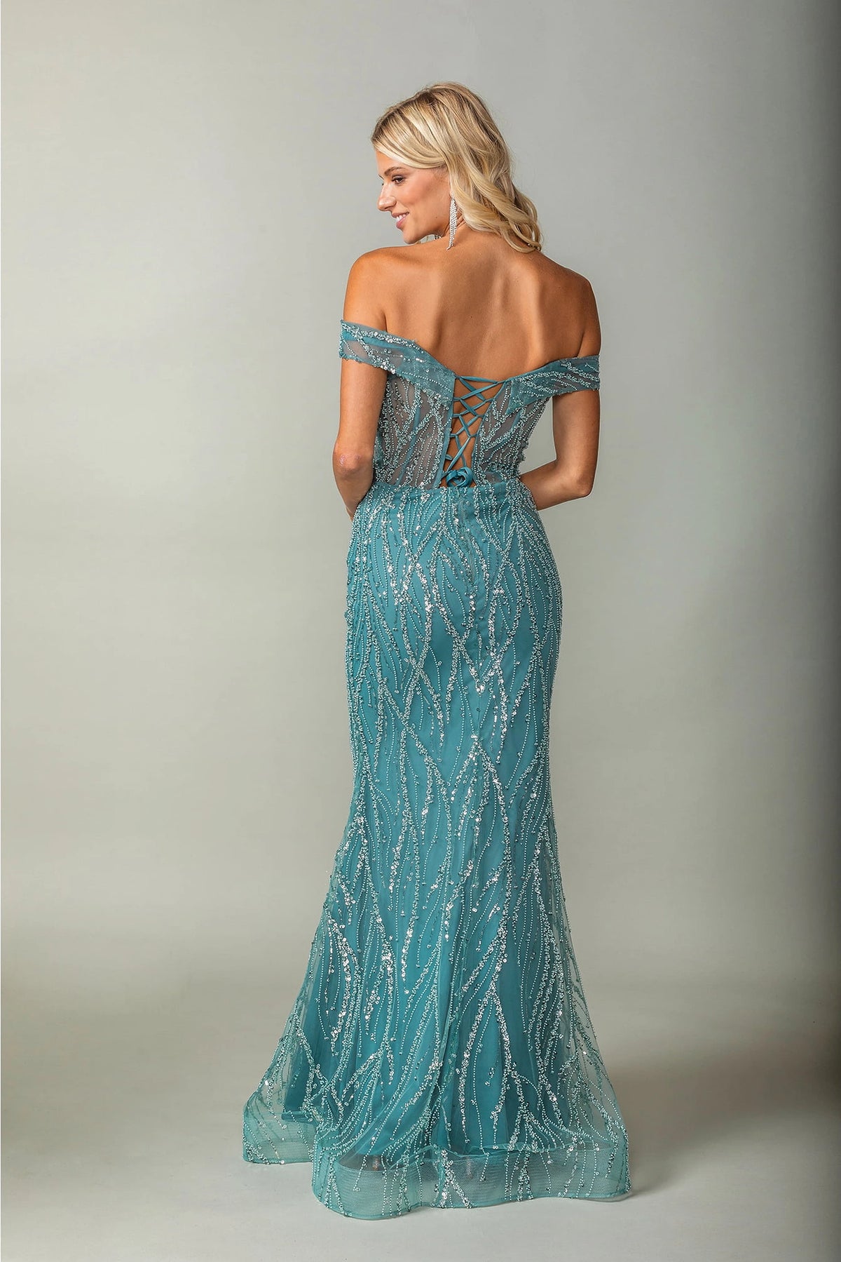 From the back, the Sage prom dress reveals its floor-length skirt.