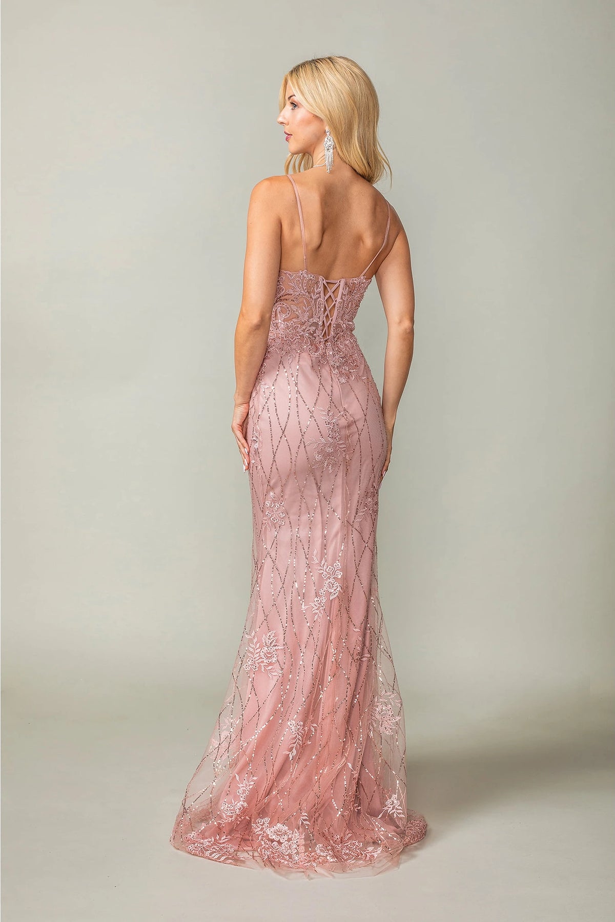 From the back, the Dark Blush prom dress reveals its floor-length skirt.