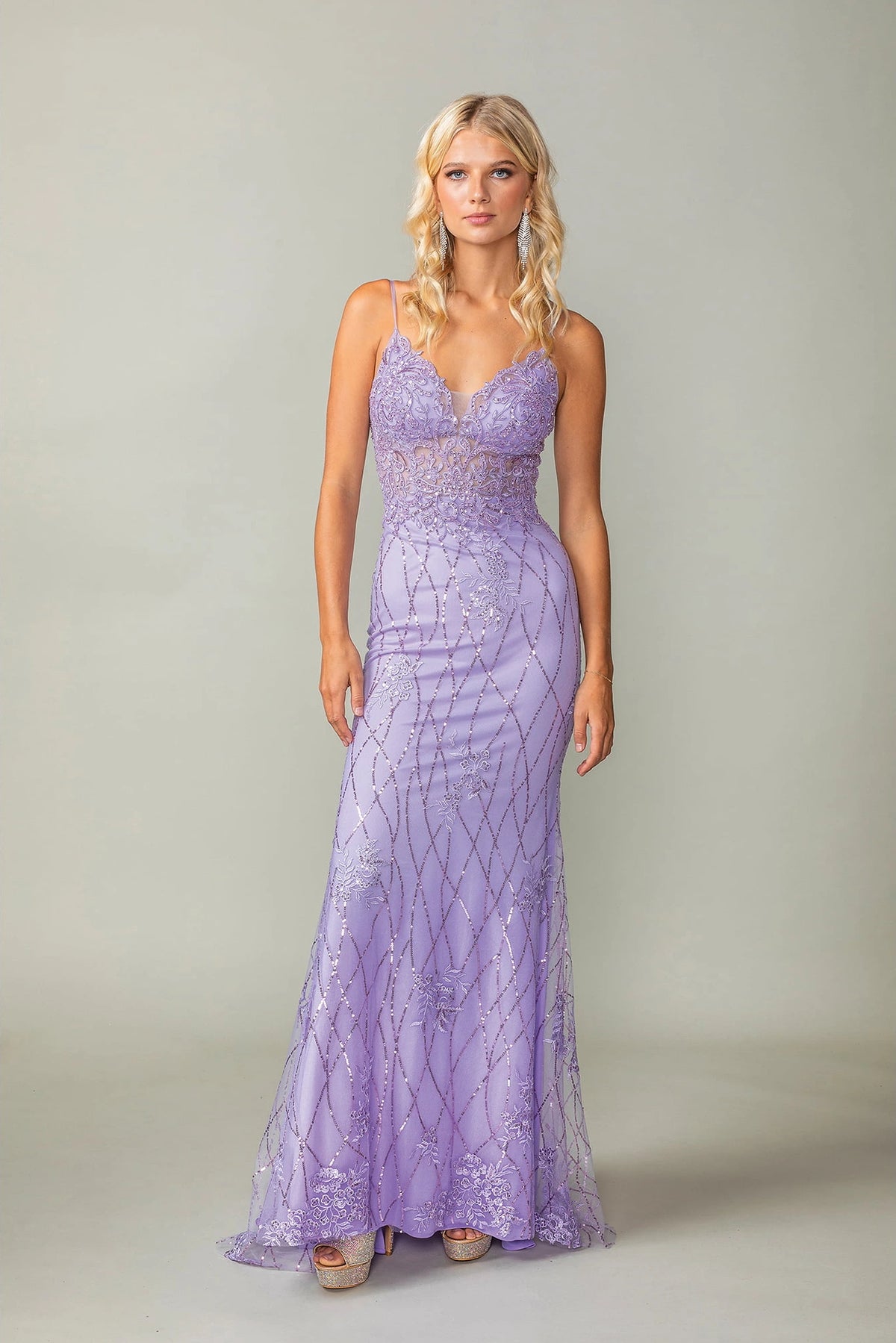 Featuring a floor-length skirt, this Lilac prom dress is shown in full view.