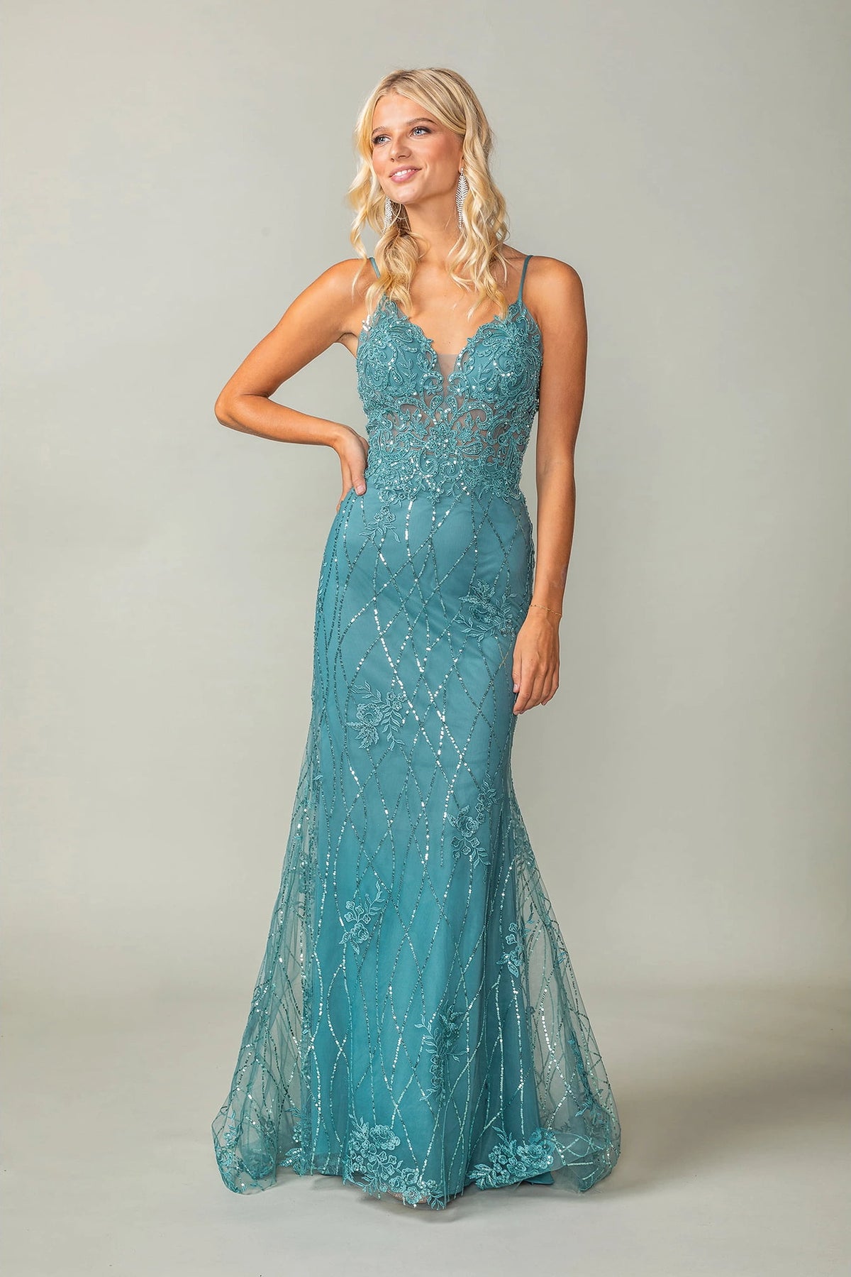 Featuring a floor-length skirt, this Sage prom dress is shown in full view.