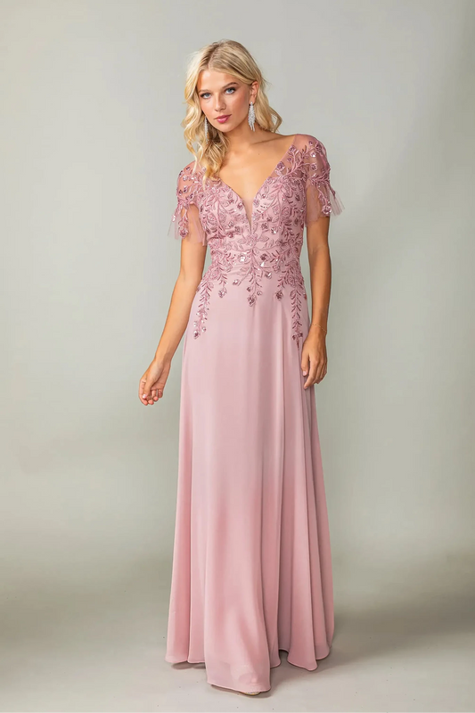 Woman in Dusty Blue prom dress with applique and flutter sleeves.