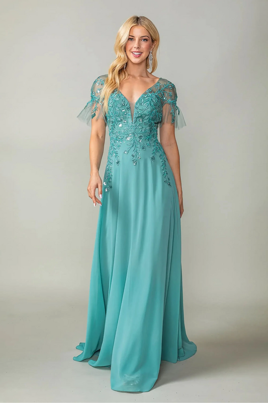 Woman in Sage prom dress with applique and flutter sleeves.