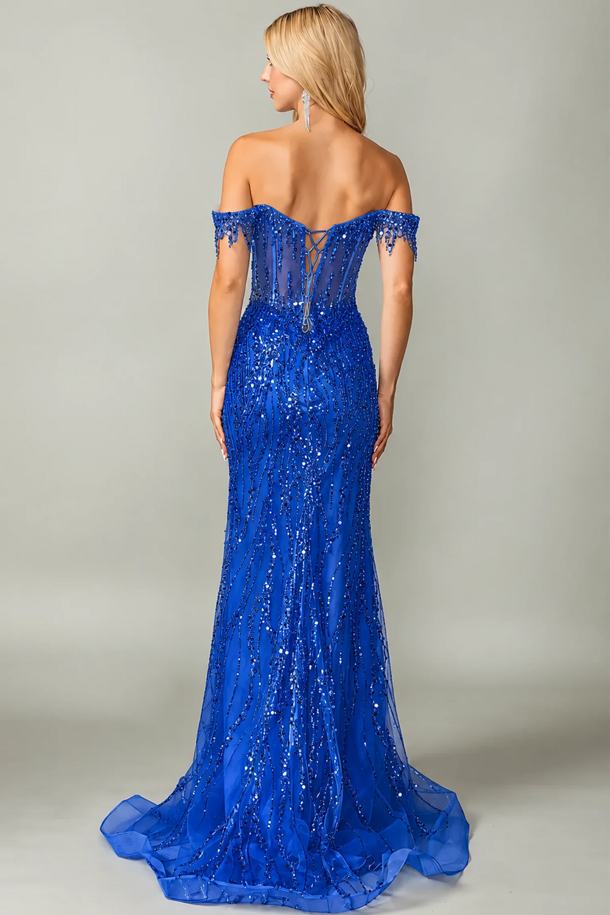 a royal blue off-the-shoulder evening gown covered in sequins and lace up back