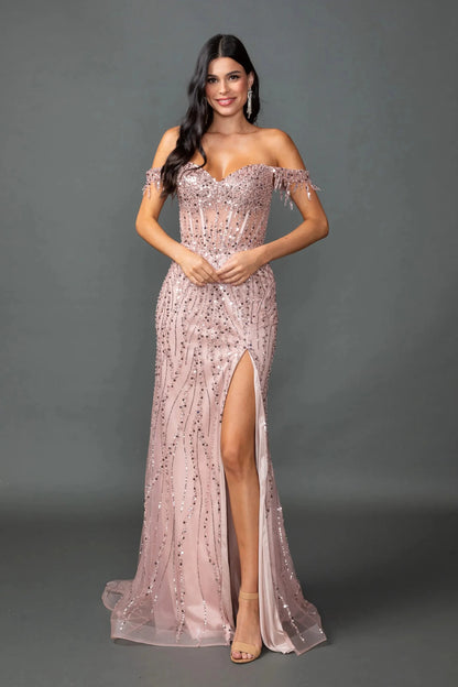 Woman in Rose gold corset prom dress with ruched skirt and slit.