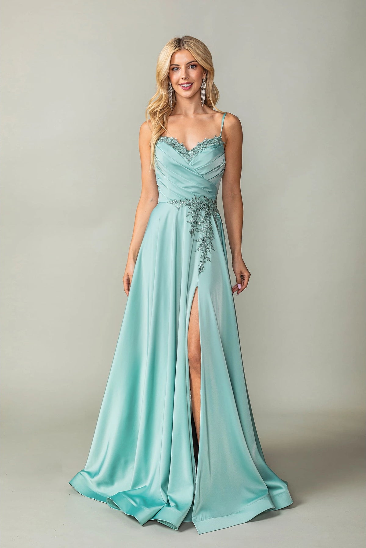 Featuring a floor-length skirt, this Sage prom dress is shown in full view.