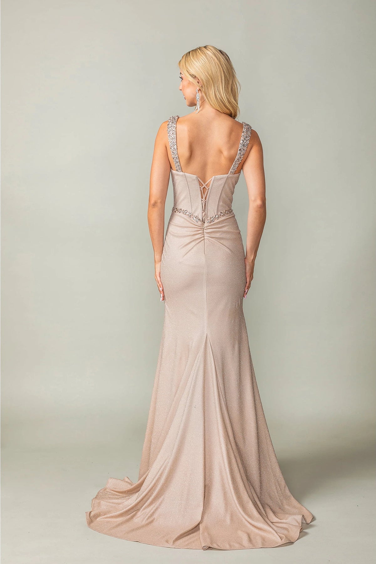 From the back, the Mocha prom dress reveals its floor-length skirt.
