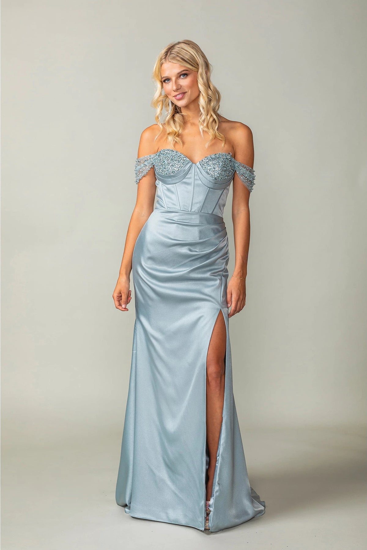 Featuring a floor-length skirt, this Hunter Green prom dress is shown in full view.