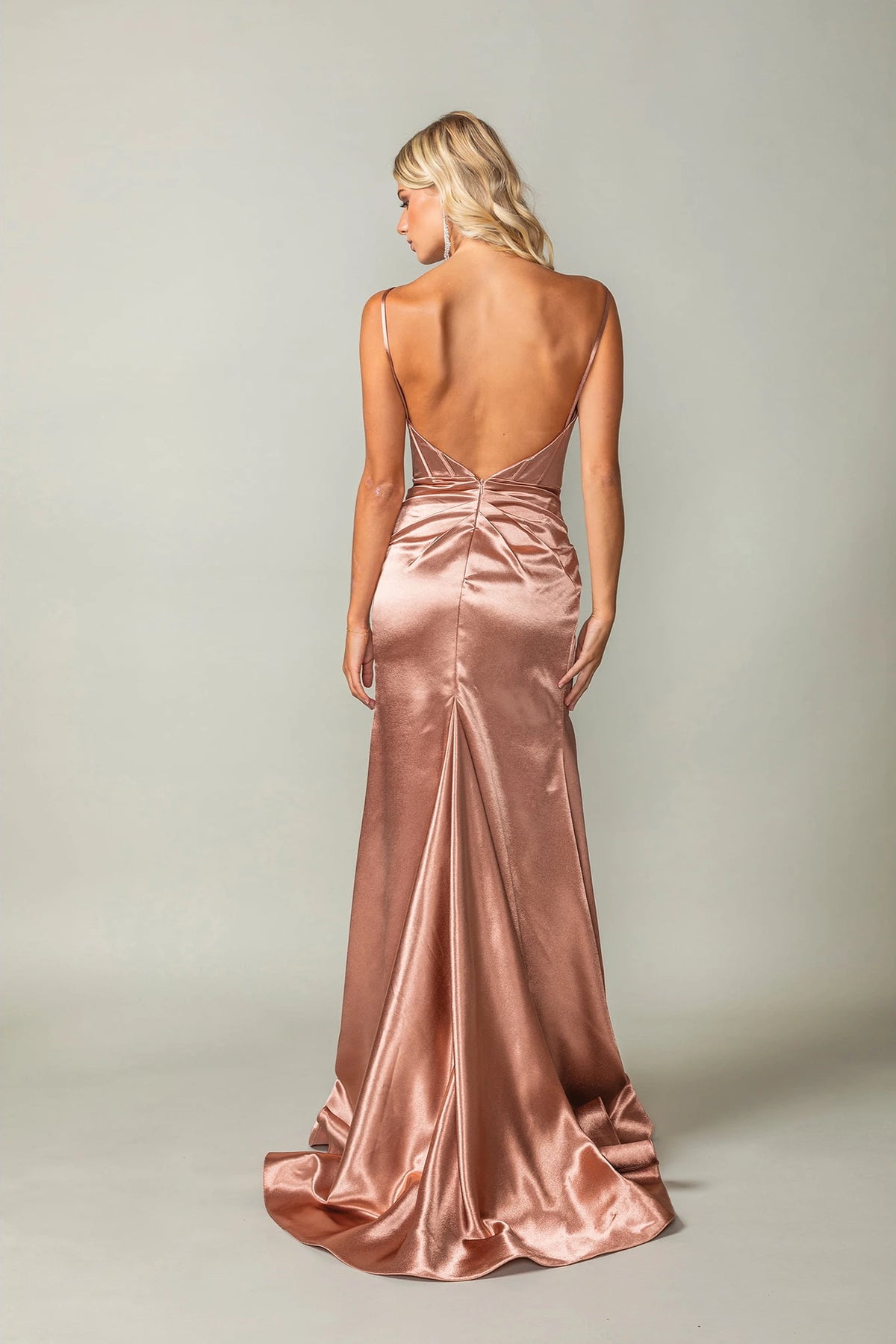 From the back, the Copper prom dress reveals its floor-length skirt.