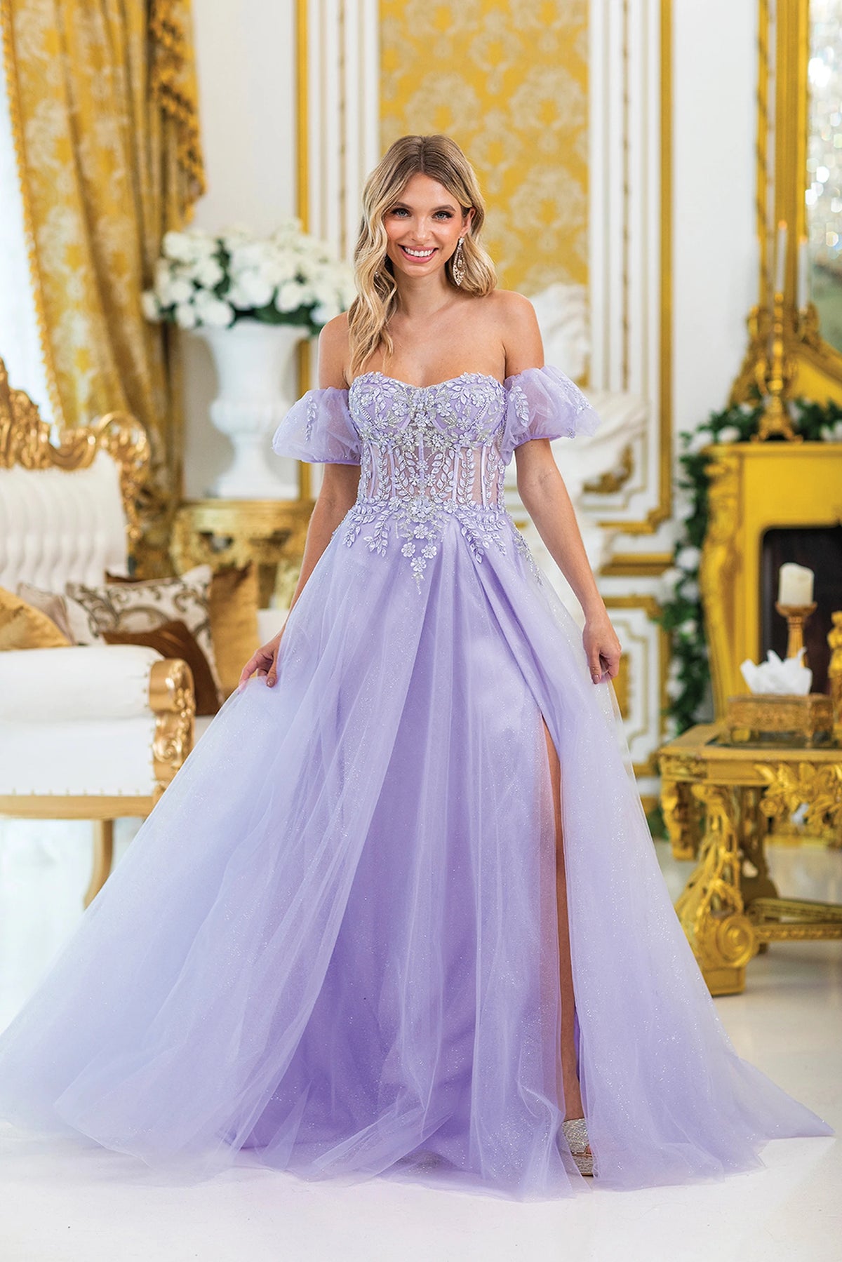 Featuring a floor-length skirt, this Lilac prom dress is shown in full view.