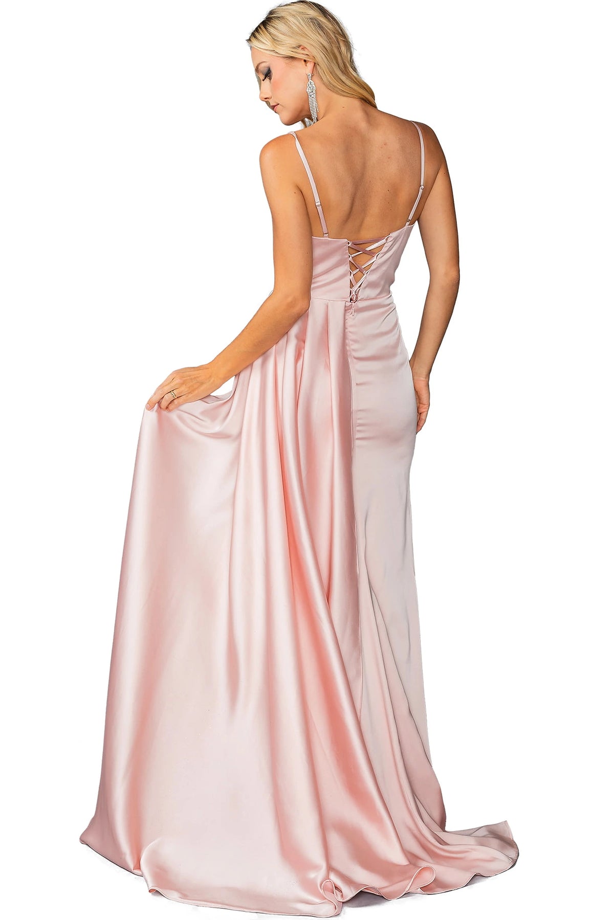 From the back, the Blush prom dress reveals its floor-length skirt.