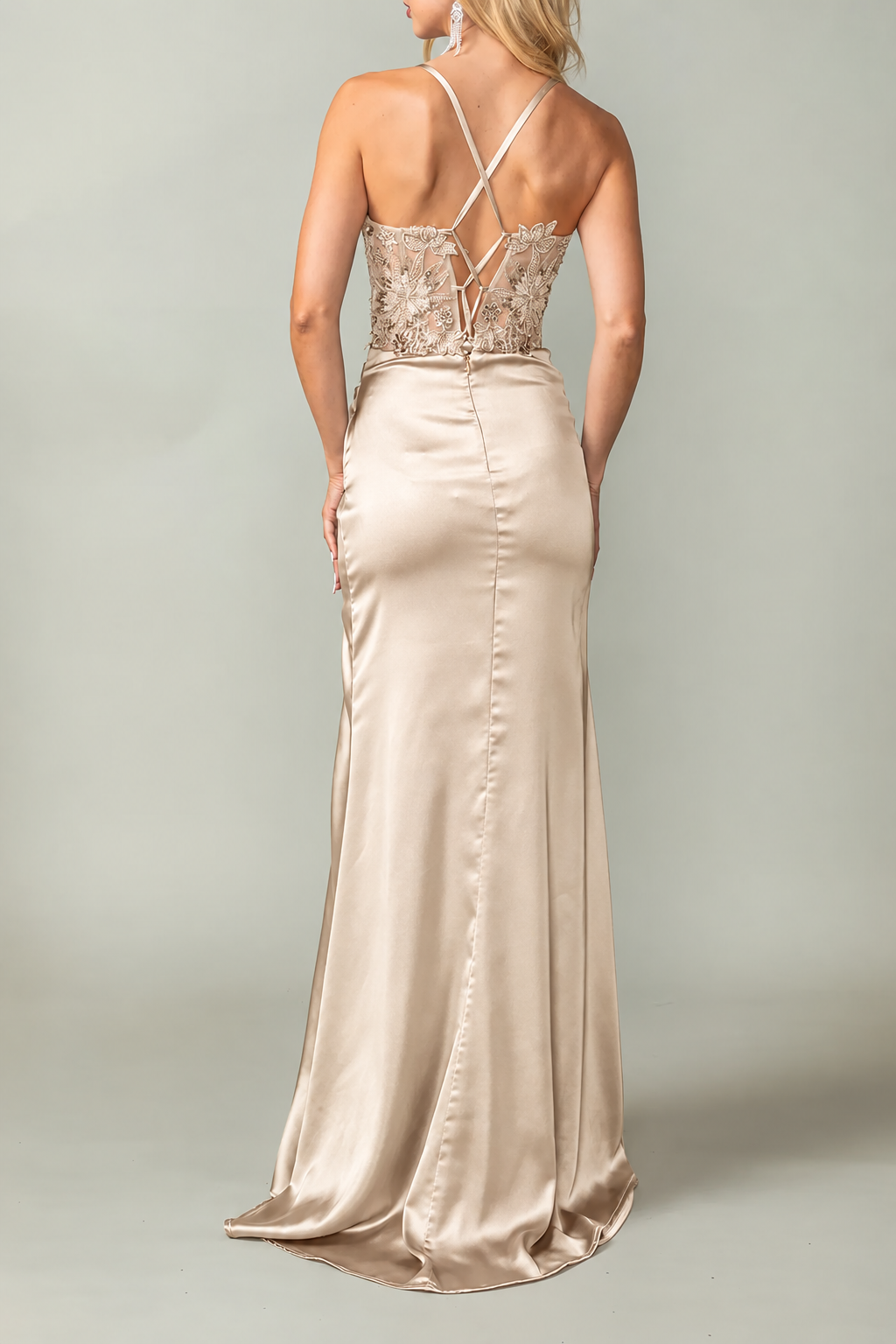 Sheer embroidered back and slim straps complete the Champagne Beaded Prom Dress.
